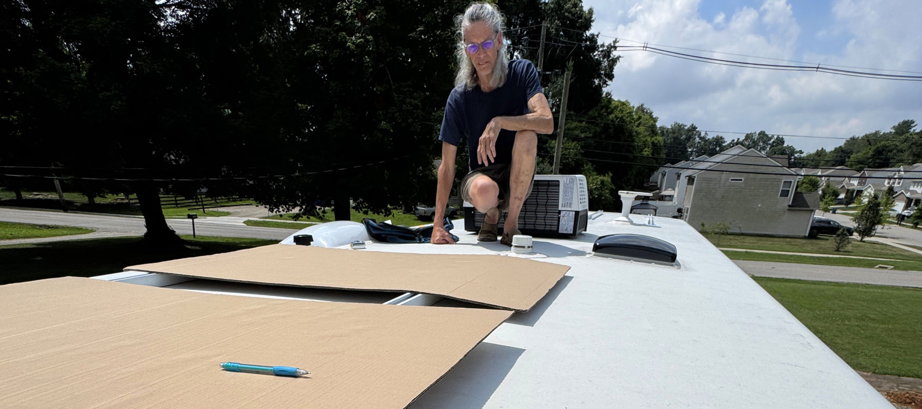 Scott on Itasca scoping out solar panel install.