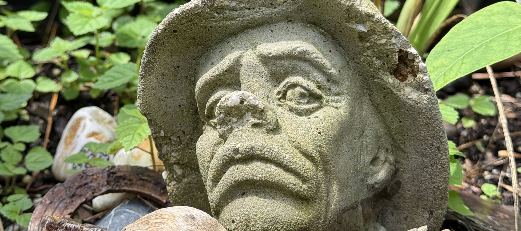 Rusty's backyard - concrete man.